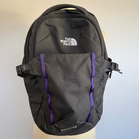 The North face Pivoter 22L Backpack in dark gray with purple - Picture 1 of 9